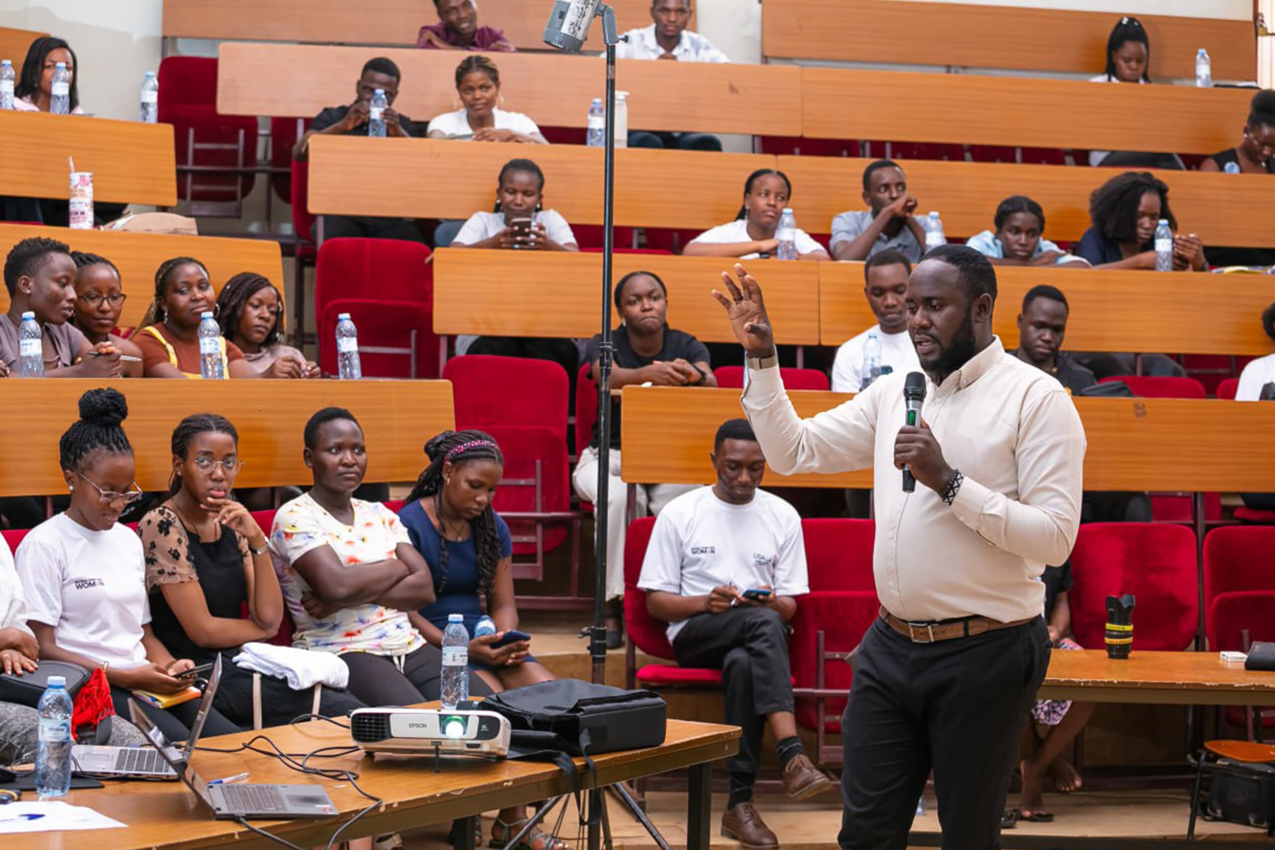 Young African people taking part in a health learning session